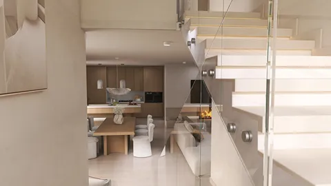 Modern living room with a cozy seating area and an open kitchen, showcasing a minimalist style with elegant decor, featuring Homestyler's real-time 3D rendering for an immersive design preview.