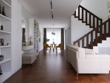 Spacious living room featuring a modern sofa, creating an inviting atmosphere with a minimalist design, enhancing comfort and functionality with Homestyler's real-time 3D rendering feature.