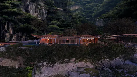 modern building surrounded by lush greenery showcasing outdoor living space, designed using Homestyler's real-time 3D rendering feature.