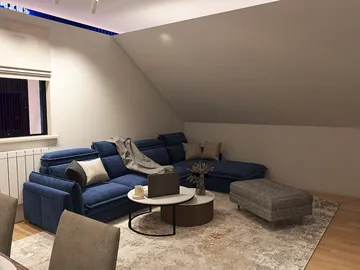 cozy blue sectional sofa arranged in a modern living room style with an elegant coffee table, showcasing interior design optimization using Homestyler's real-time 3D rendering feature for effective living space enhancement.