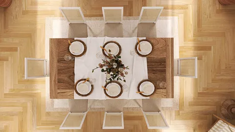 dining table set for a meal with decorative centerpieces in a modern style, showcasing an elegant interior design, featuring real-time 3D rendering capabilities from Homestyler.