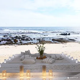 cozy beach seating arrangement with cushions and plants creating a serene atmosphere, designed to optimize outdoor relaxation space, utilizing Homestyler's real-time 3D rendering feature.
