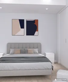 Modern bedroom with a simple bed layout featuring stylish wall art and neutral colors, focusing on minimalist design aesthetics and utilizing Homestyler's real-time 3D rendering functionality for design preview.