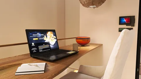 a modern home office setup featuring a laptop on a wooden desk, creating a serene workspace atmosphere with minimalistic design, enhanced by the real-time 3D rendering capability of Homestyler.