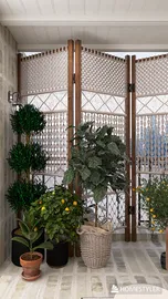 indoor plants arranged with a decorative screen in a bright space, showcasing modern home decor, featuring Homestyler's real-time 3D rendering for effective design visualization.